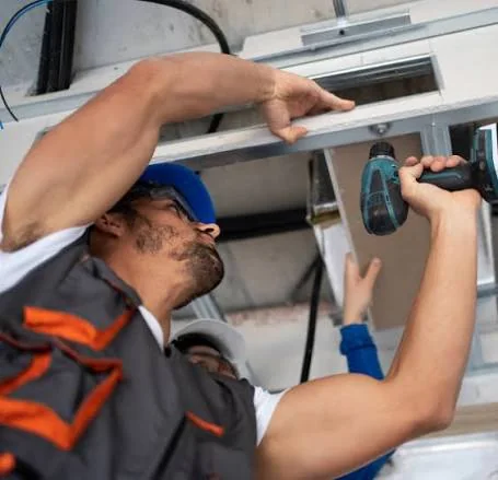 Technician model assembling residential HVAC equipment during installation